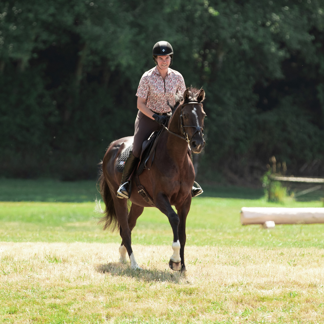 Kerrits Cool Ride Ice Fil Short Sleeve Shirt on Rider Riding Cantering Horse