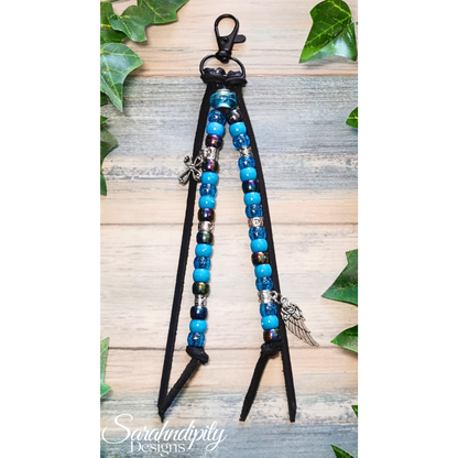 Saddle Charm - Turquoise and Black with Cross and Feather Charm